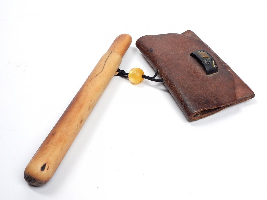 Japanese Wallet and Chopstick Case: A leather purse with bronze handles and various motifs with a bone chopstick case. Some losses.