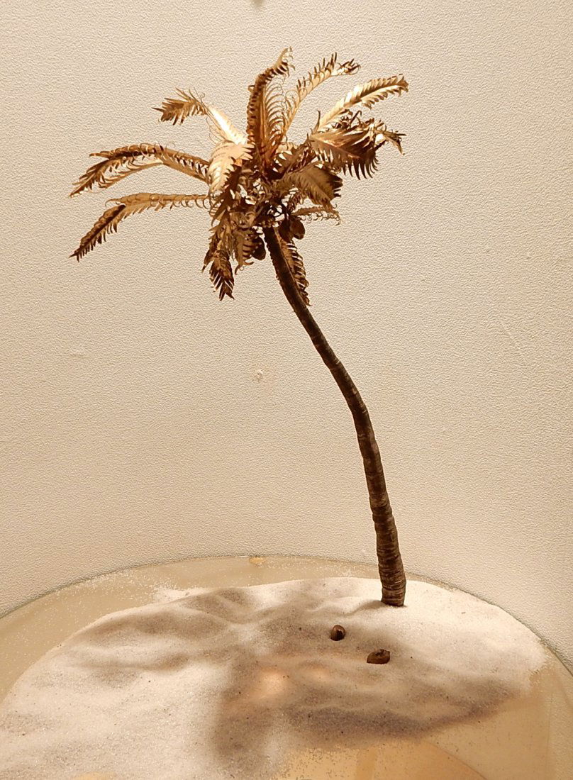 Charles Lamb Bronze Palm Tree: Gilt ad patinated model of a coconut palm tree with chased trunk and gilt palm fronds. [Overall: 14"]. In good condition.