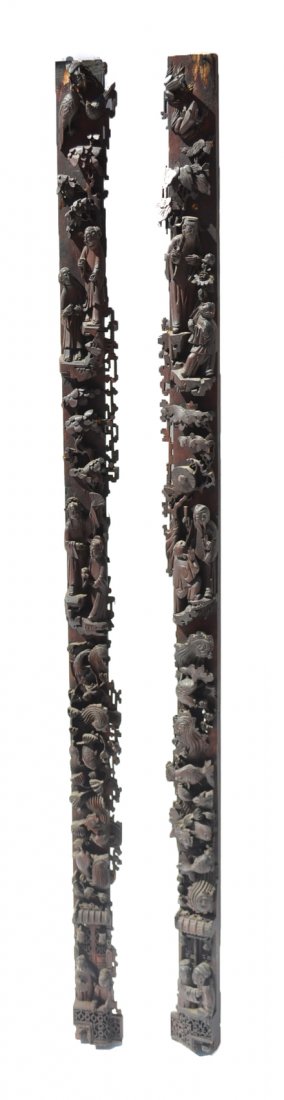 Two Chinese Carved Wood Friezes: Two Chinese carved wood architectural elements with figures, koi, dogs, and birds. [57 1/2" x 3" x 2" (each)]. Losses to carvings.