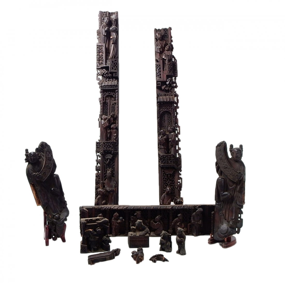 Lot of 6 Chinese Wood Elements: Carved teak wood architectural elements and base along with high relief Chinese figures. Includes bag of small pieces. [Base: 16 1/4" W x 13 1/2" D x 7 1/2" H]. [Architectural pieces: (largest) 29 1/2