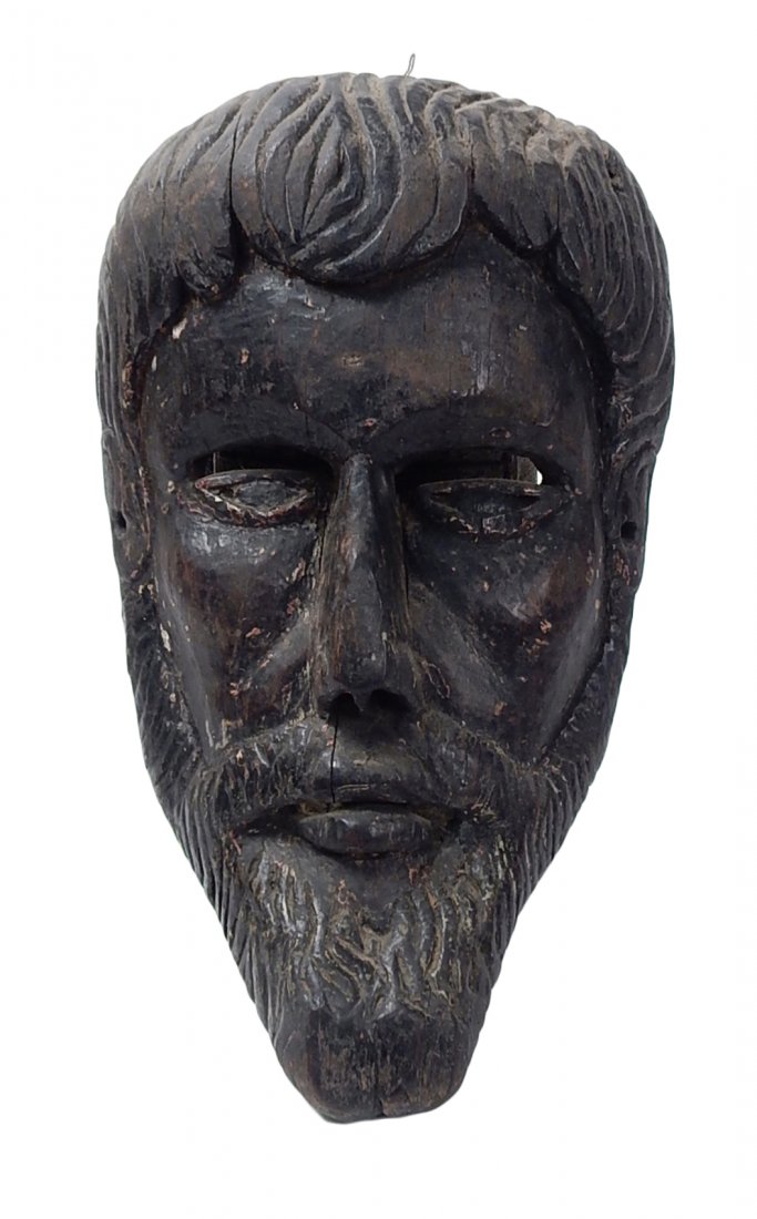 Carved Wood Mask: Carved wood mask wall hanging of a man with a beard. [10" x 6 1/2"]. Splits in wood.