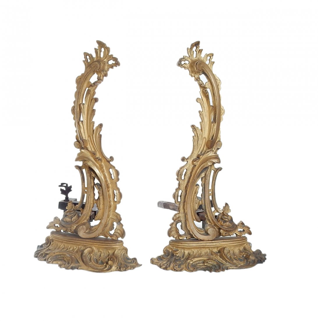 Pair of Rococo-Style Gilt Andirons: A pair of Rococo-style gilt andirons. [19 1/2" Dia. x 21" H]. Some wear.