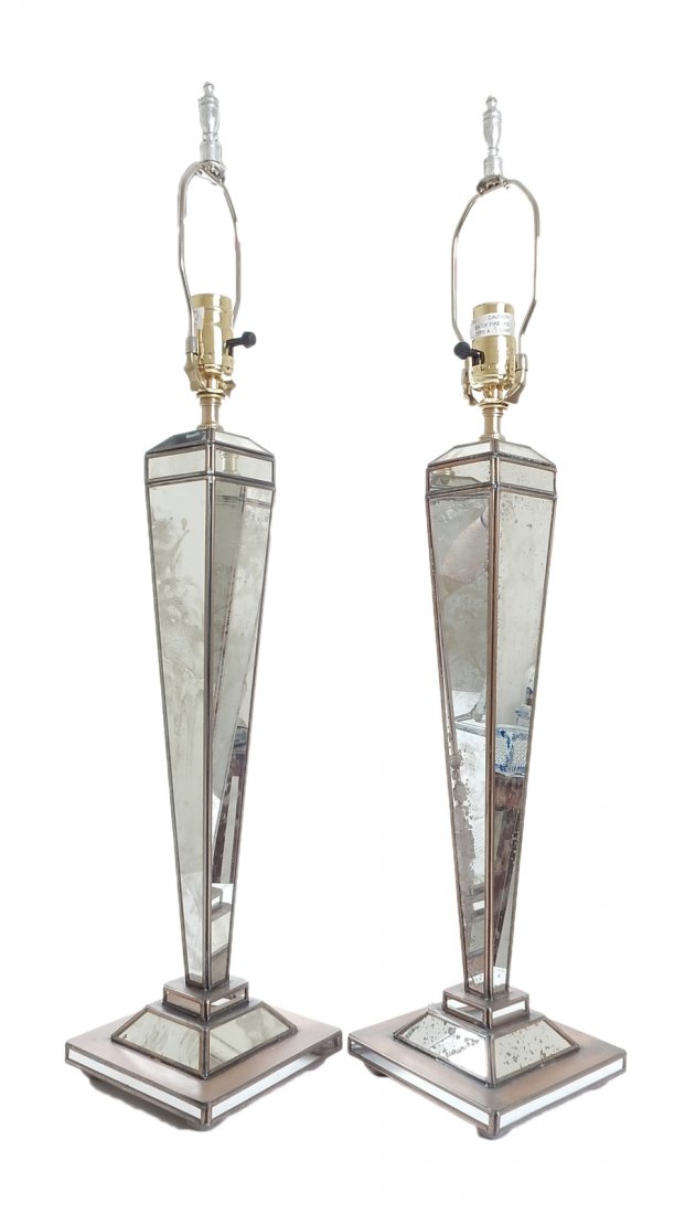 Pair of Mirrored Table Lamps: Pair of modern geometric shaped mirrored table lamps. [28" H (to finial)]. Minor wear and loss to mirrored surfaces, wiring not tested.