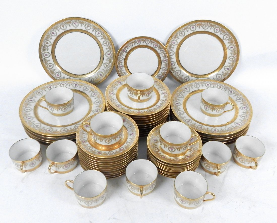 58-Piece Limoges Dinner Service: 58-piece Limoges porcelain dinner service comprising: 12 dinner plates, 12 dessert/luncheon plates, 12 cups, 10 saucers, 12 bread plates. Each piece marked. [Dinner plate: 10" Dia]. Overall in good co