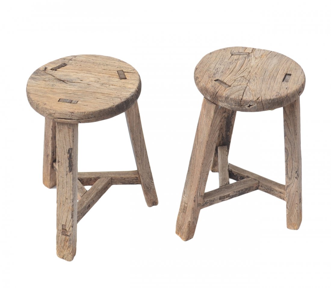 Pair of Rustic Stools: Pair of handmade rustic wood stools. [12" W x 19 3/4" H]. Worn with cracks and paint loss.