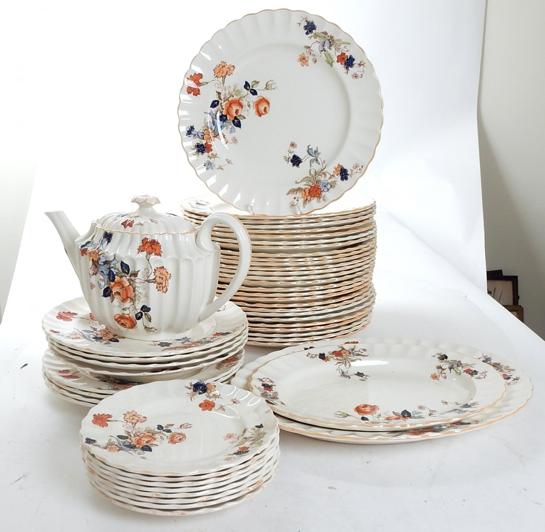 Lot of 40+ Spode Copeland Dinnerware: Copeland Spode England dinnerware comprising: 1 teapot with cover [6" H], 2 platters, 7 dessert plates, 3 soup bowls 5 luncheon plates, 27 dinner plates [10 1/2" Dia]. Various chips, sold "as is".