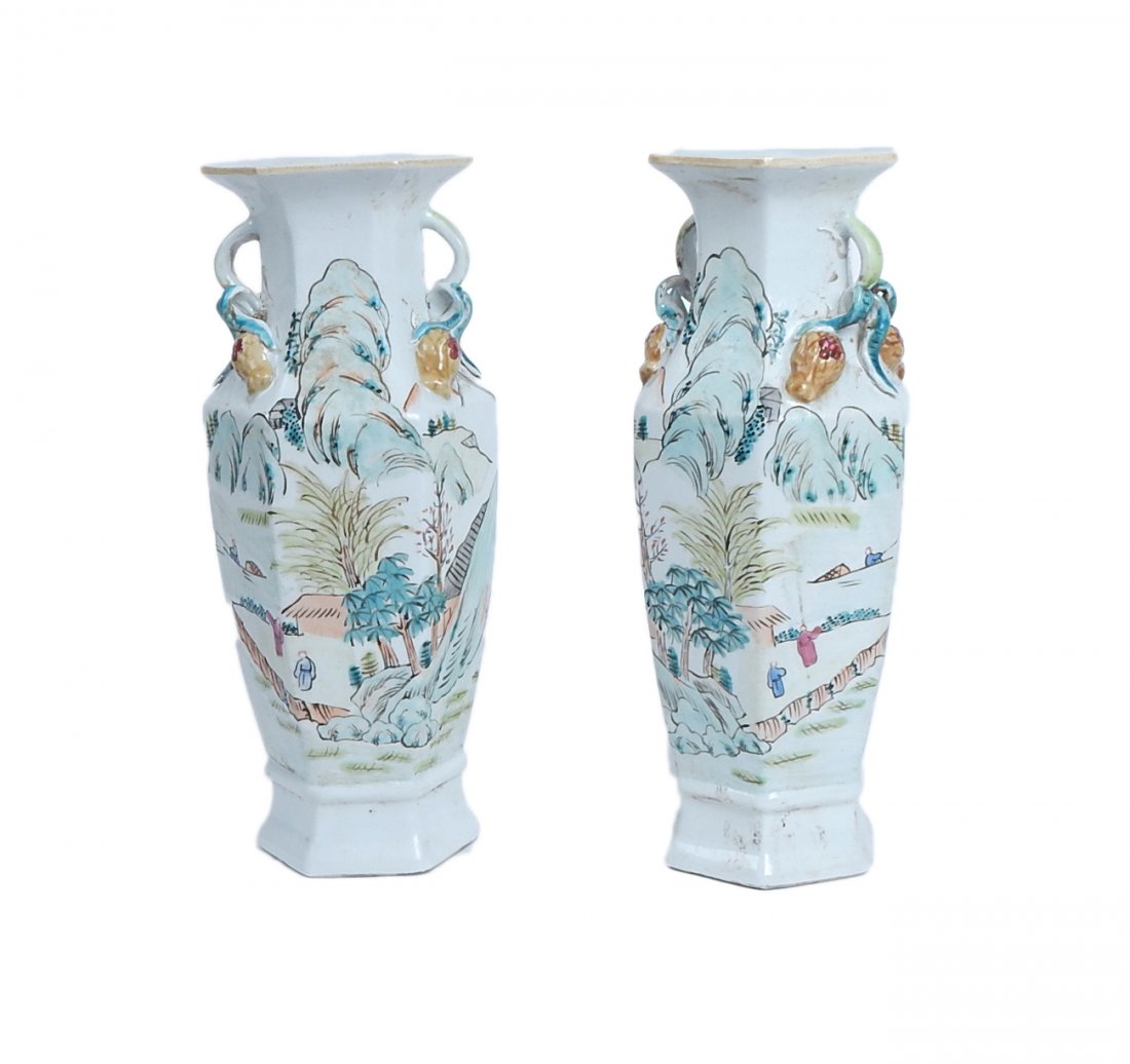 Opposing Pair of Chinese Vases: Pair of hexagonal porcelain vases with hand-painted opposing landscapes and calligraphic inscriptions. Each [3 3/4" Dia. x 9 1/4" H]. Light soiling.