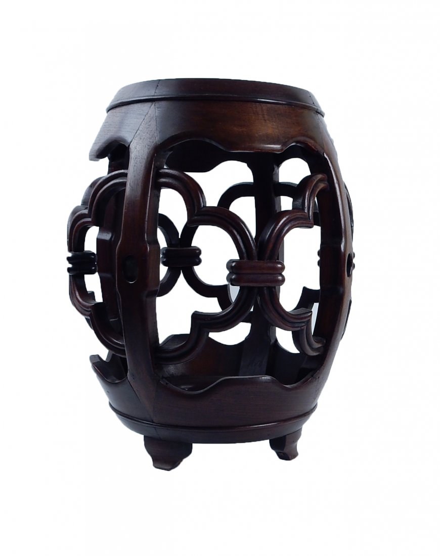 Small Circular Wooden Asian-Style Stool: Small circular wooden Asian-style stool with wooden openwork ornamentation. With circular hardstone insert. [15" W x 18 1/2" H]. Surface scratches, overall good condition.