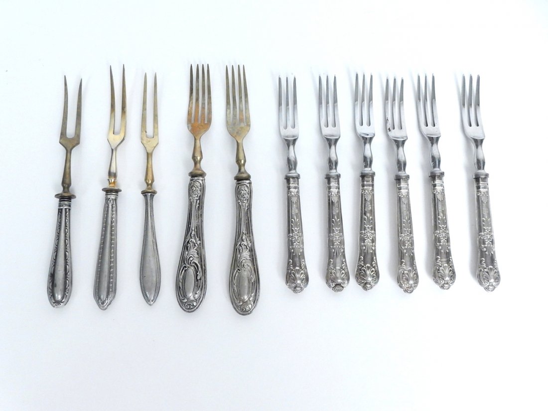 11 Pc Set of Sterling and 800 Silverware: Set of six forks marked sterling and Sheffield and a set of three meat forks and two forks marked 800. Stored in original box. 11 pieces. [6" L] 5.225 ozt. sterling, 3.43 ozt + 800 silver.