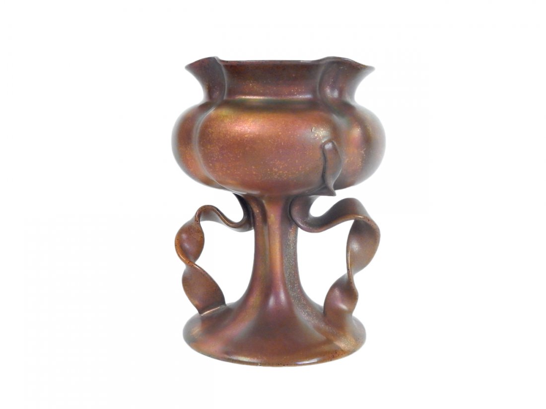Zsolnay Art Nouveau Vase: Iridescent copper-tone ceramic vase with two handles and flared rim. Marked "Zsolnay Pecs" on bottom and stamped "Zsolnay Pecs/5440/27/M." [5 1/4" Dia x 6 5/8" H]. Chip at edge on bottom.