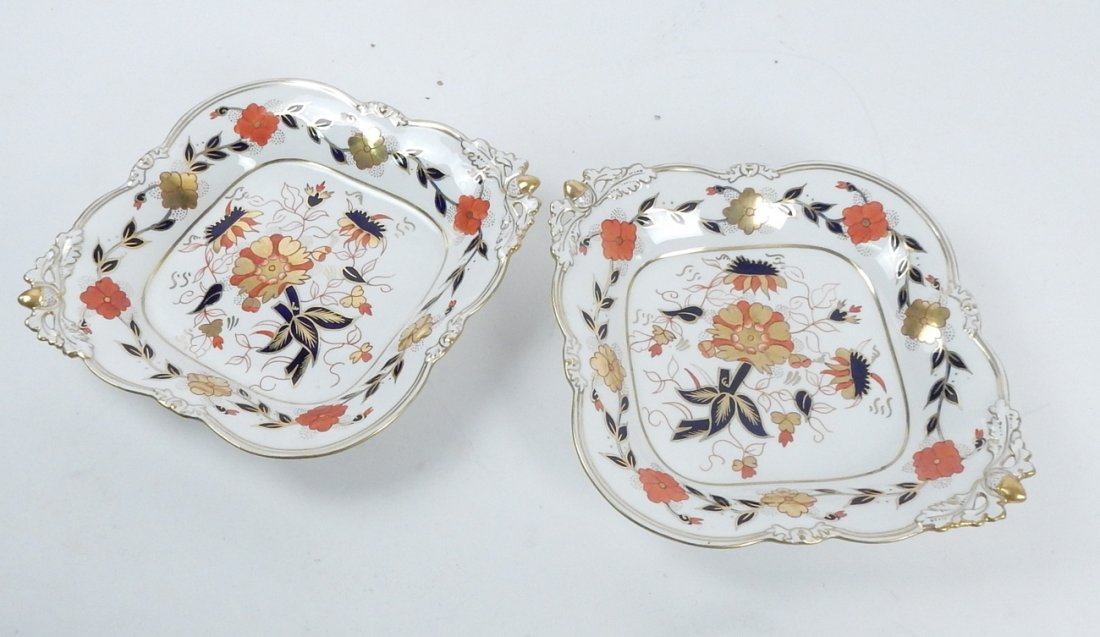 Two Tiffany & Co. Serving Dishes: Two Tiffany & Co. Royal Crown Derby square serving dishes, one with acorn motif decorated with gilding, the other blue and ironstone red. [Each: 9" Square x 2 1/2" H]. Good condition.
