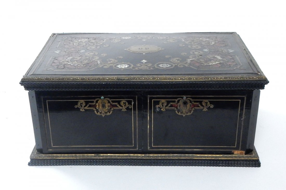 Antique Boulle Work Jewelry Box: Black lacquered box with ornate lid featuring inlaid brass scrolling leafy tendrils, tortoiseshell reserves, and mother-of-pearl accents. Top lifts open, two front doors are hinged and possibly open w