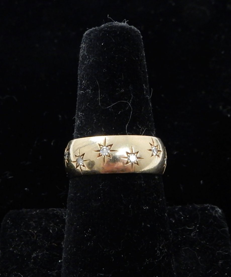 Cartier 14k Diamond Wedding Band: Features 12 rose cut accent diamonds. [Each approximately .2 ct]. Set into star-shape settings.