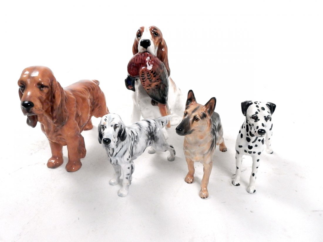 5 Royal Doulton Dog Figurines: Comprises: 5 various types of dogs by Royal Doulton. [Tallest: 6 1/2" H]. In good condition
