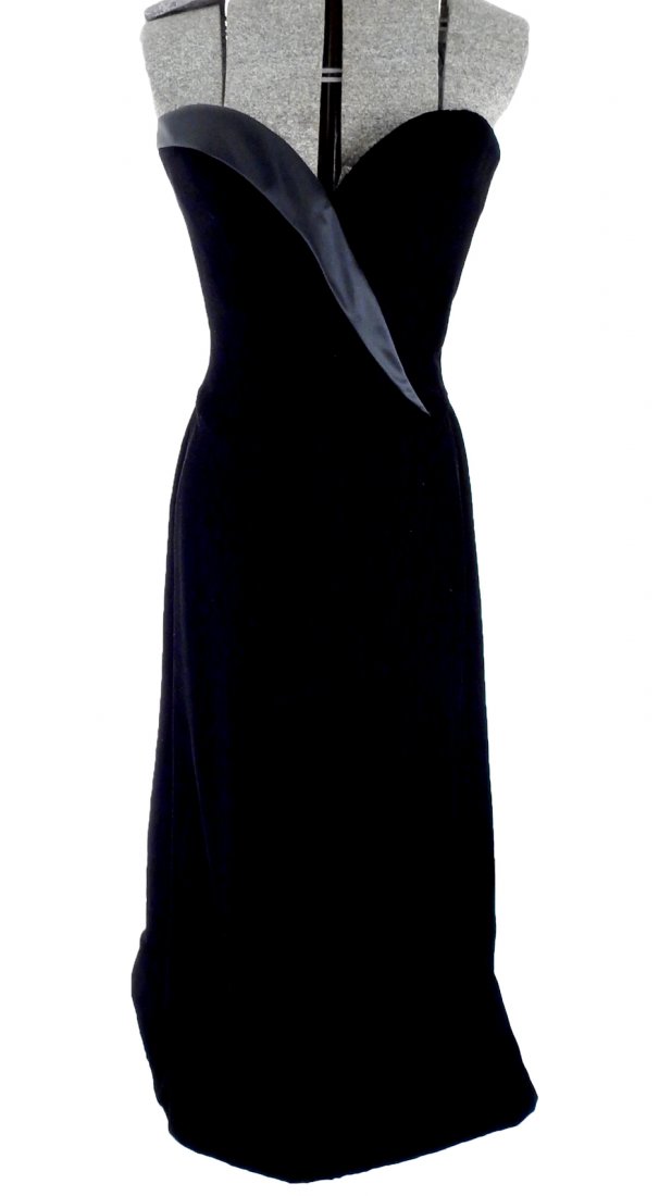 Bob Mackie Black Evening Gown: Strapless black velvet evening gown with a black satin back panel and on front straps. Labeled Bob Mackie. From a Greenwich, CT collection.