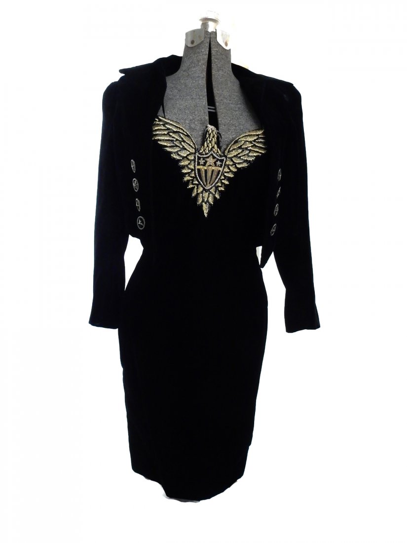 Bob Mackie Black Velvet Evening Dress: Elaborate strapless Bob Mackie black velvet dress with ornate beaded ornamentation of an eagle with shield at the center. Accompanied by the matching bolero jacket. Size 6.
