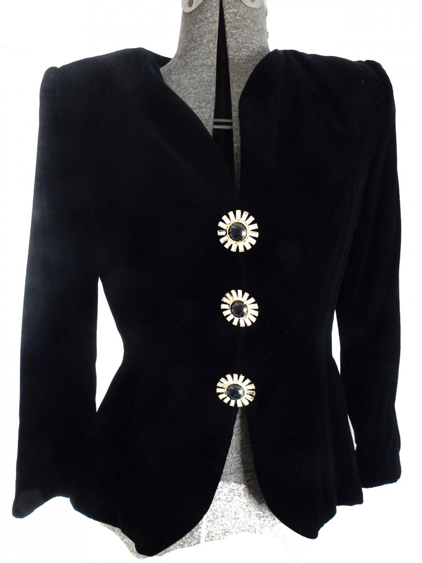 Black Velvet Bob Mackie Evening Jacket: Black velvet ladies evening jacket by Bob Mackie with three large metal flower shaped buttons. Bears Bob Mackie label. Size 8.