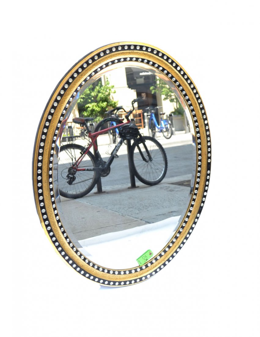 Large Oval Mirror: Large oval painted mirror, decorated with a crystal surround. Some crystals missing, otherwise in good condition.