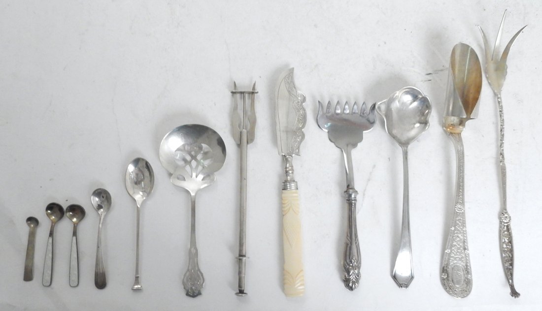 12 Pc. Assortment of Sterling Flatware: Assortment of sterling flatware and serving pieces, including a marrow scoop, berry scoop, sardine fork, cheese server with Bakelite handle, a variety of spoons, meat fork, and others. 5.245 ozt weigh