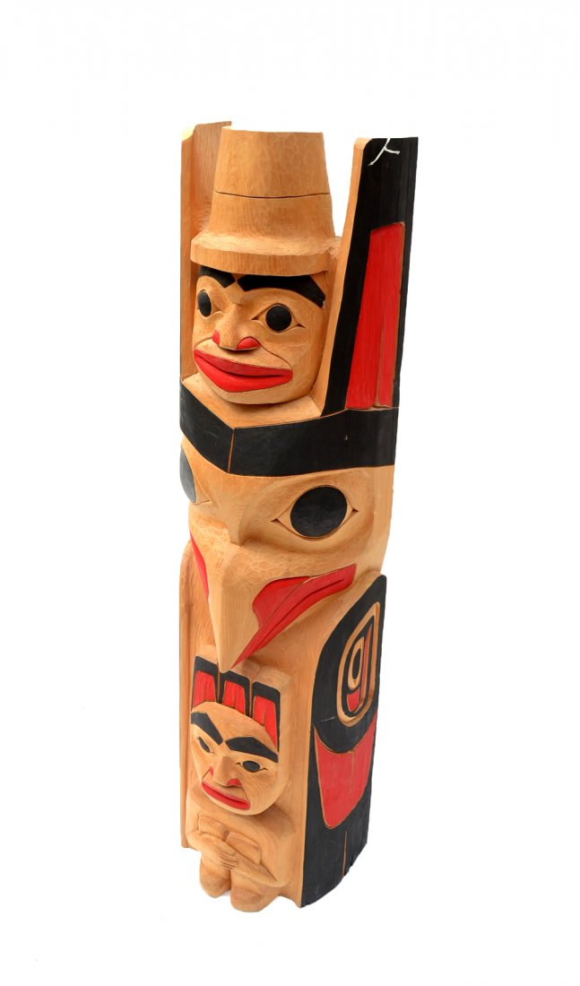 Native American Type Totem Pole: Contemporary painted totem pole with anthropomorphic element. Carved from one piece of wood. [12 3/4" W x 10 1/2" D x 51" H].