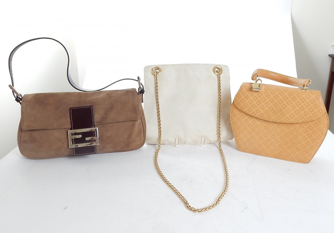 Fendi Ladies Handbag, Two Evening Bags: Assembly of three ladies handbags, including one brown suede leather Fendi purse, one "Desmo" ivory purse with retail tag inside from Saks Fifth Avenue, and one yellow "Lucbenoit" Italian purse. [Fend