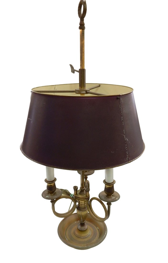 Vintage Bouillotte Lamp: 3-light brass and bronze lamp with scrolling arms and tole shade. [13 1/8" Dia. x 28 1/2" H]. Light oxidation and surface wear throughout.