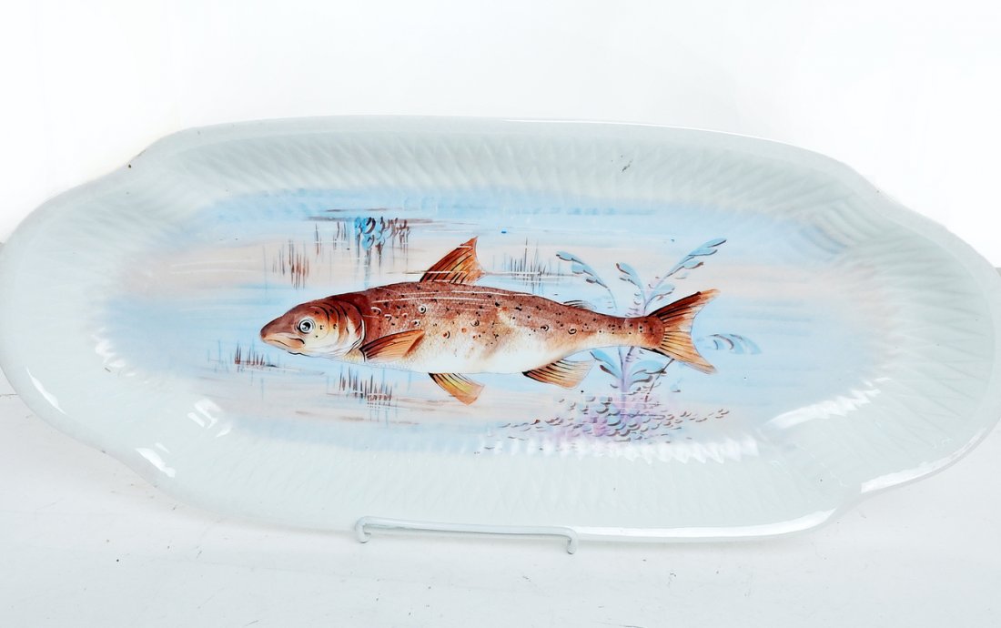 Large Limoges Ceramic Fish Platter: Large Limoges fish platter with a large fish in water decoration on the bottom of platter. Marked "Limoges" on bottom. [23 1/4" L x 9 1/2" W]. Minor wear to edges. Overall good condition.