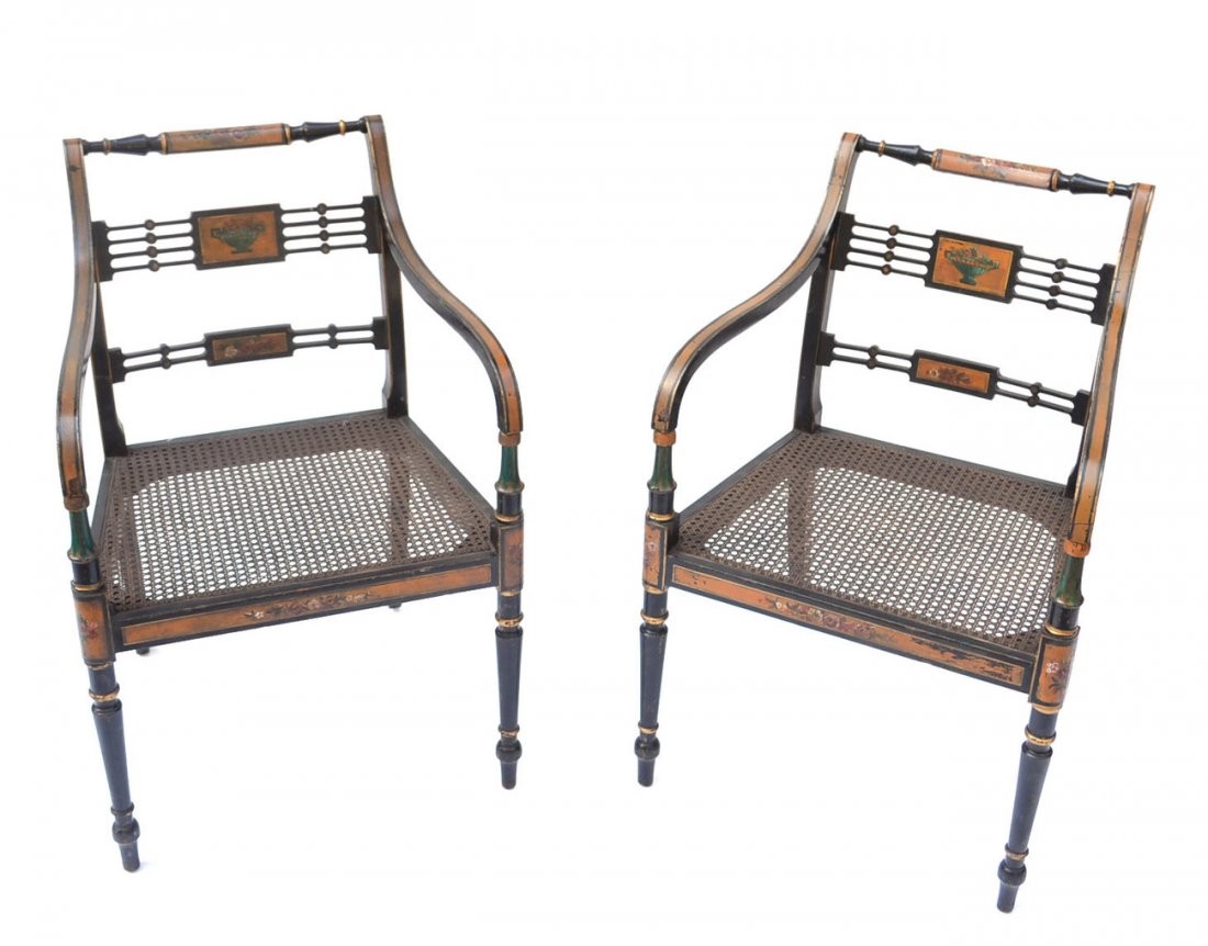 Pair of Regency-Style Caned Armchairs: Painted open armchairs with painted decor, turned supports and pierced slats. [21 1/2" W x 20 1/4" D x 33 1/4" H; 16" H to seat]. Wear throughout.