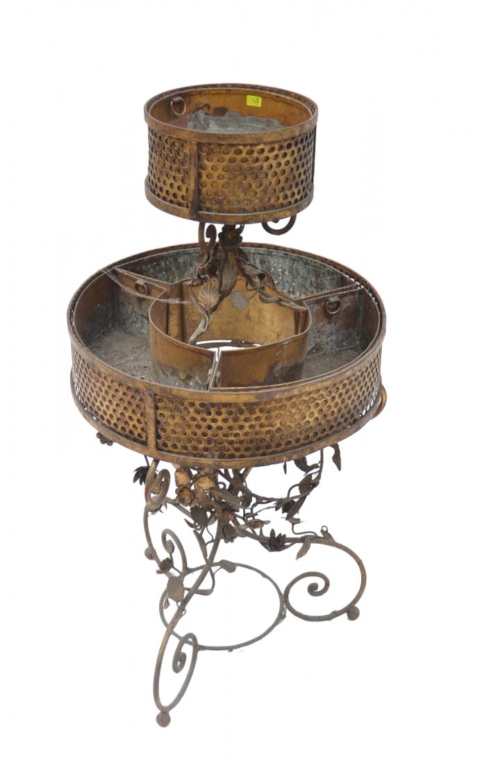 Two-Tier Planter: Gilt metal two-tier iron and tole planter. [15 1/2" Dia x 32" H]. Finish very worn, some rusting.