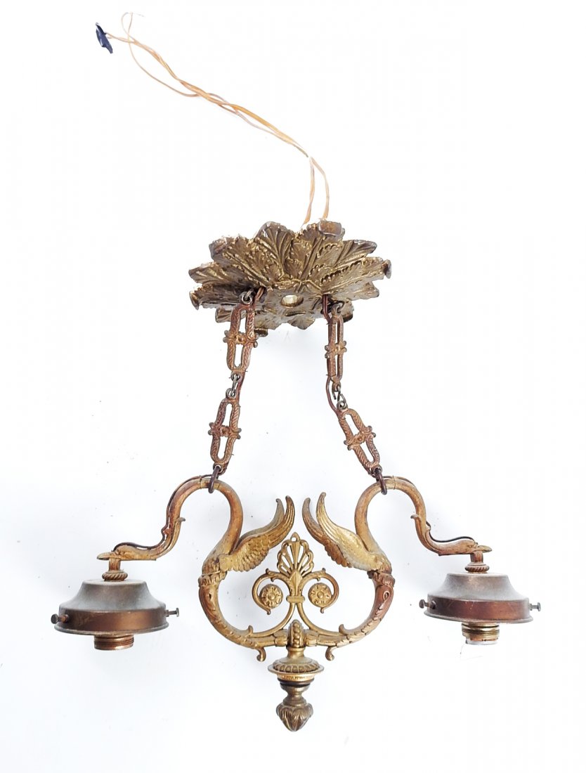 Empire Ormolu Hanging Lamp: Empire ormolu hanging lamp with two winged birds holding lights. [17 1/2" H x 16" W]. Missing globes.