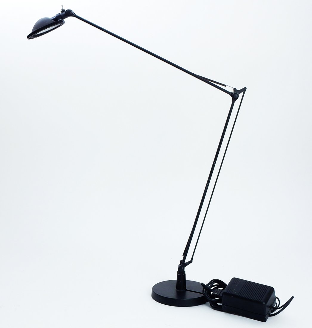 Tizio Lamp by Richard Sapper: Adjustable tizio desk lamp designed by Richard Sapper. [Fully extended: 43" H x 5 3/4" Dia]. In good condition.
