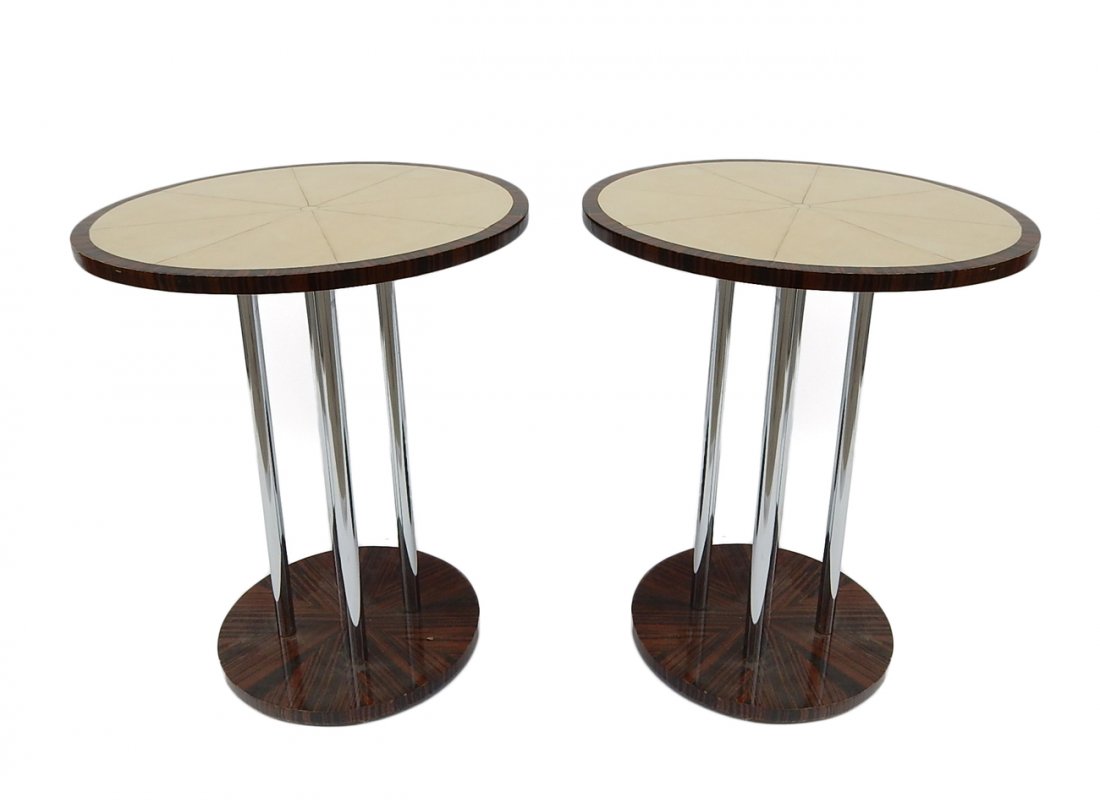 Pair of Ebony and Parchment Tables: Pair of round art deco style Makassar Ebony and parchment tables. [22" dia. x 26" H]. Minor scratches. Signs of wear on edges.