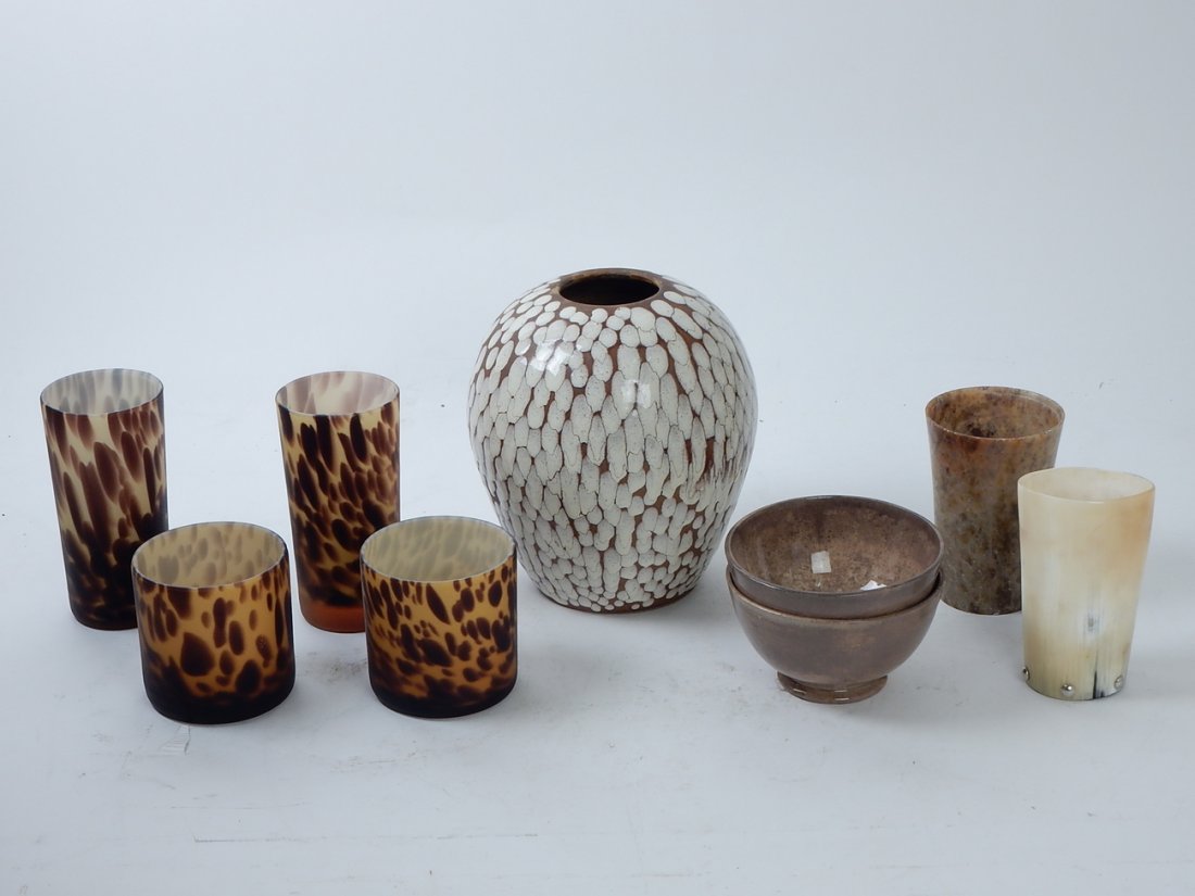 Lot of Nine Assorted Items: Comprises: One vase, signed "A. Renoleau" with mottled brown glaze; four leopard camphor glasses; two latte bowls; one horn cup; one alabaster cup. Good condition.