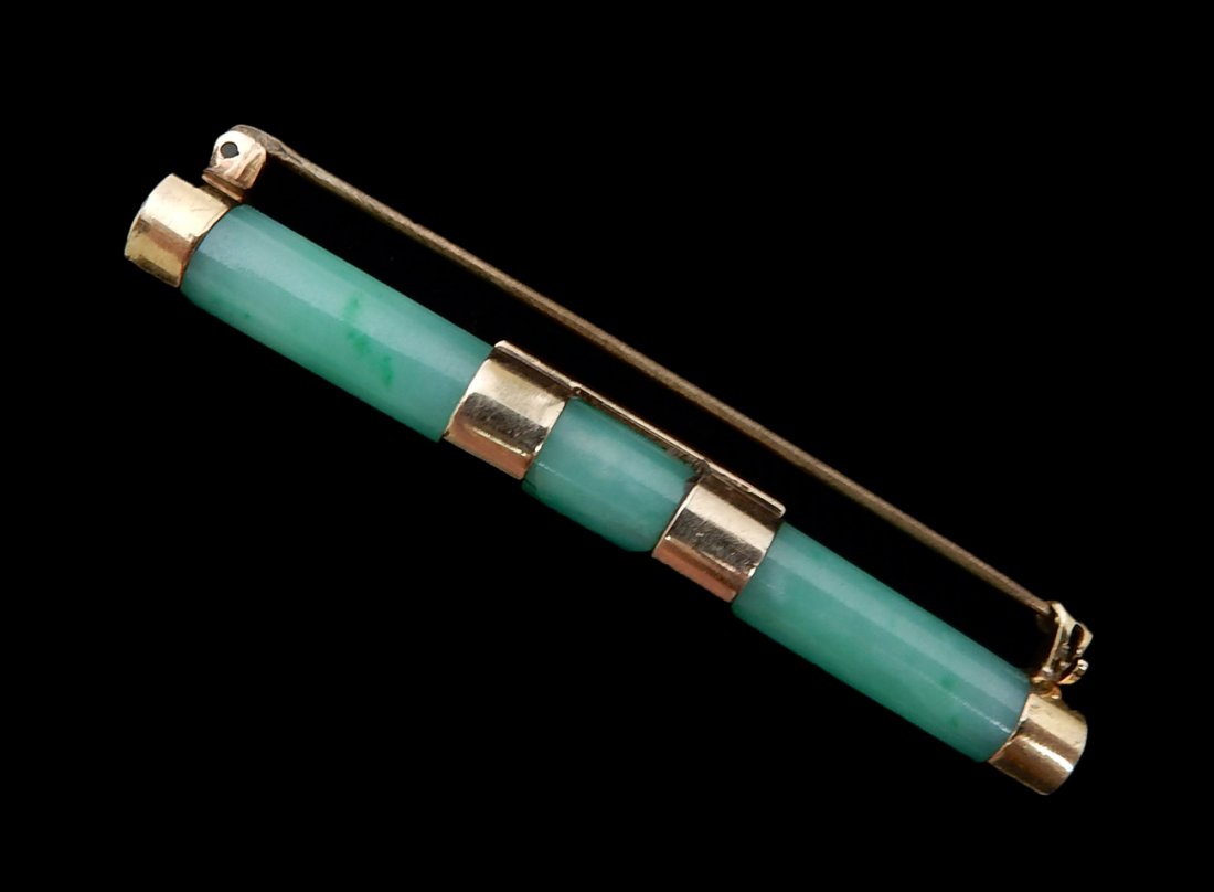 14k Gold and Jade Bar Pin: Spinach jade round pin with four collars of 14k yellow gold.