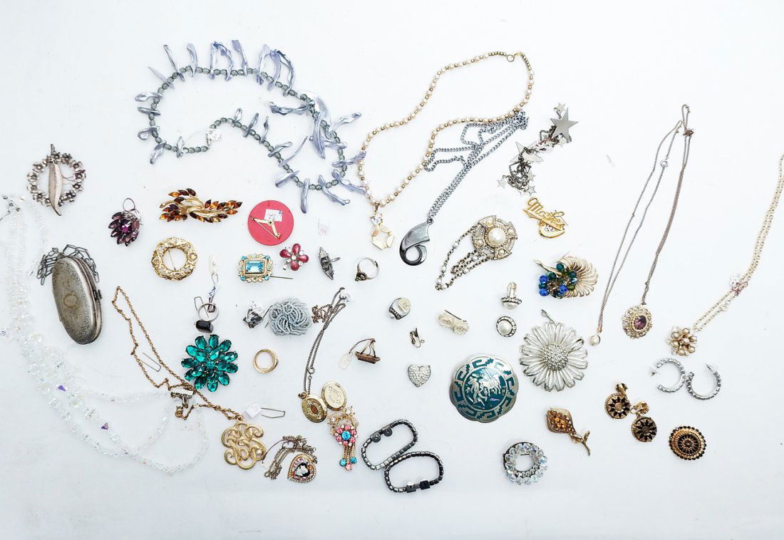 Lot of Costume Jewelry: Includes assorted pins, boxes, chains, bracelets, more.