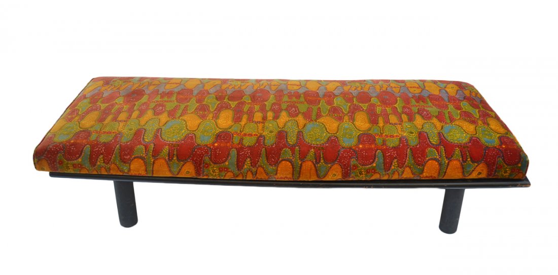 James Mont Manner Day Bed: Black lacquered frame, geometric upholstery of green, blue, and yellow. [75" L x 30" D x 16" H to top of bed]. Frame and upholstery worn.