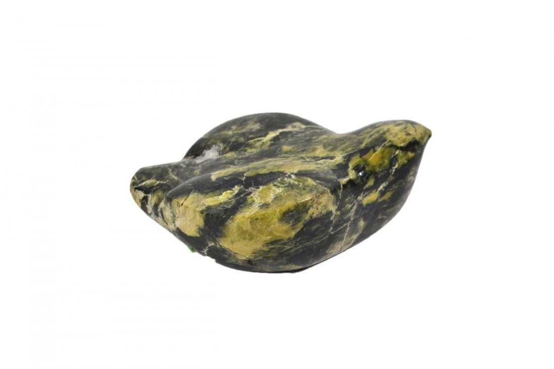 Inuit Manner Green Hardstone Sculpture: Bird form green hardstone sculpture. [10 1/2" W x 7 1/2" H].