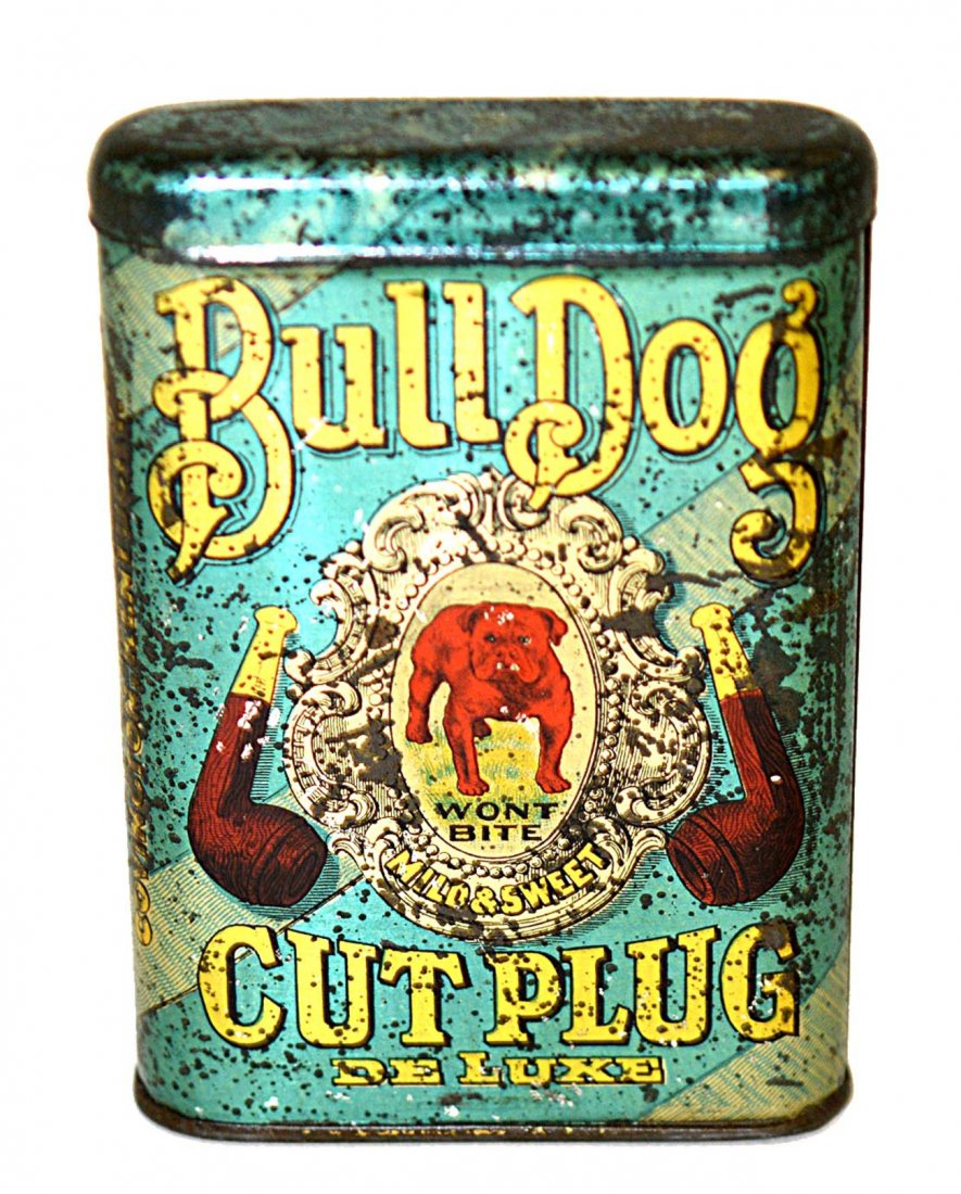 Bull Dog Cut Plug Deluxe Tobacco Pocket Tin: Bears hinged lid and metallic chromolithographic printing. 3 1/8" W x 7/8" D x 4 3/8" H. Scratches and scuffs with pitting throughout.