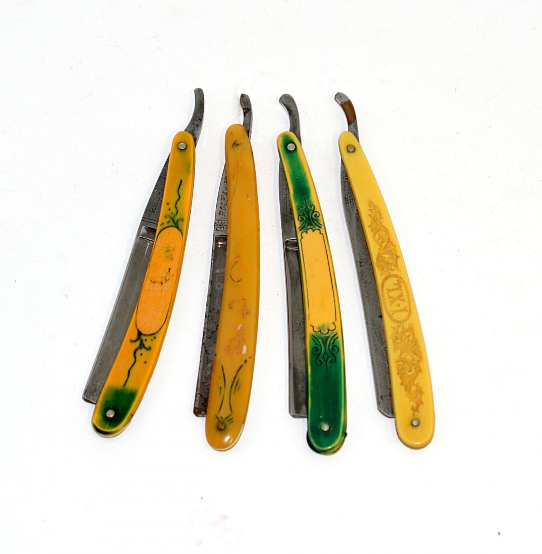 Four Straight Razors with Ornamental Sca: Comprises variously incised and moulded celluloid scales, blades include: 1.) "Rolka & Klein / Solingen Germany" on shank with "Our Best" etched on blade. 2.) "Red-Injun / No. 101," and "H. Boker & Co