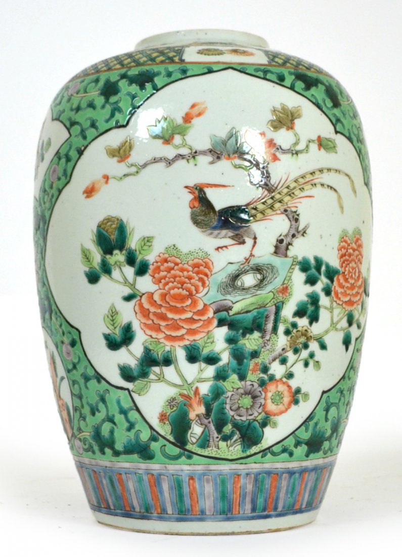 Chinese Porcelain Jar: Famille verte style enameled Chinese porcelain jar. Bears old repairs.