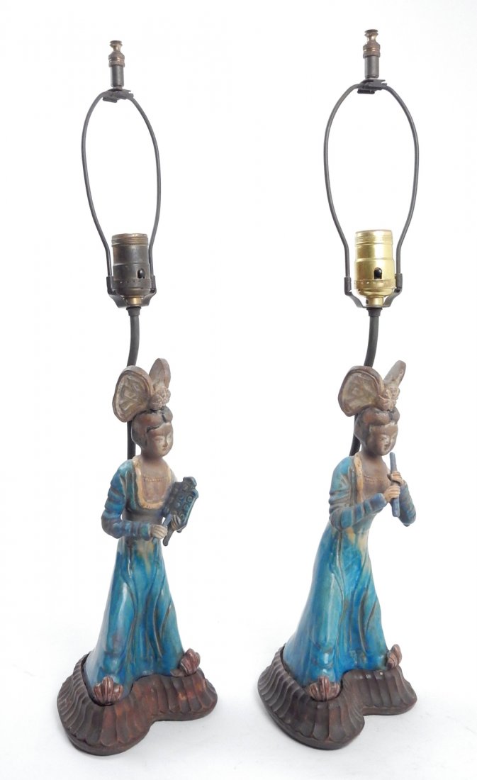 Chinese Tang Courtesan Musician Lamps: Comprises a pair of blue and yellow glazed earthenware figures depicting courtesans with elaborate headdresses playing musical instruments. Both mounted on carved wood bases. Pottery only: [4 1/4" W x