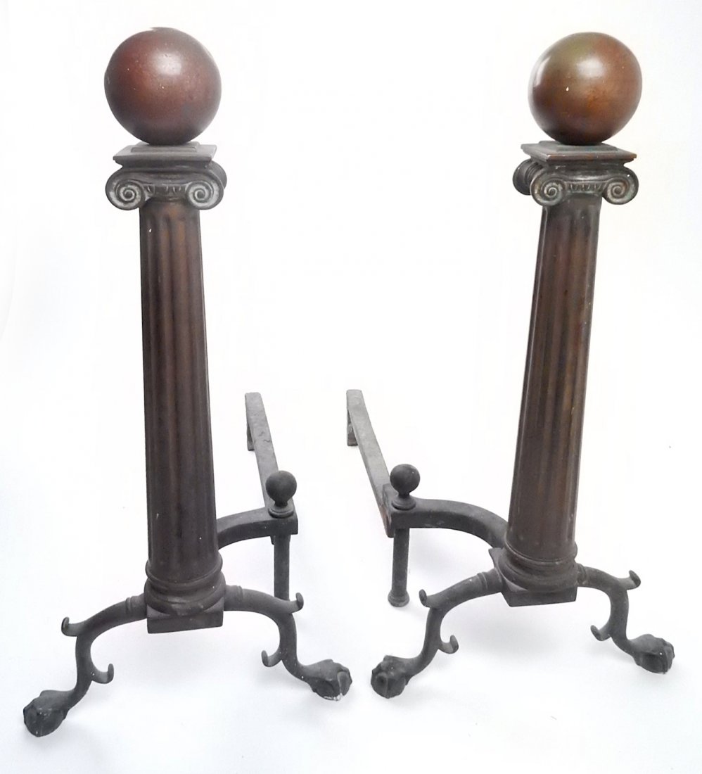 Pair of Bronze Andirons: Pair of large cast bronze ball & column form fireplace andirons. [22" H x 11 1/2" W x 20" D]. Good condition, patina with some verdigris and white paint speckles.