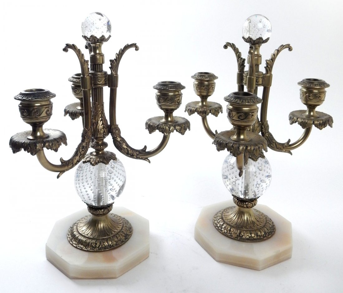 Pair of Pairpoint Candelabra: Pair of pairpoint glass and gilt brass three-arm candelabra candlesticks with white onyx bases. [14 1/2" H x 9 1/2" Dia]. Minor abrasions to finial.