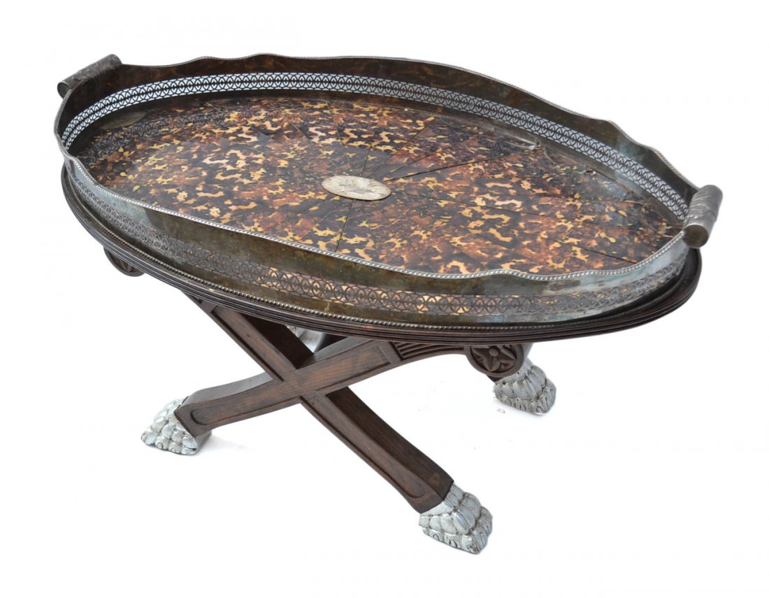Silver Plate Gallery Tray on Low Table: Tray-top low table in faux tortoiseshell and silver plate gallery tray. Hallmarked "H&L". Bears wood base with silvered paw feet. [38" L x 23 1/4" W x 19 1/4" H]. Distressed, missing faux inlay.