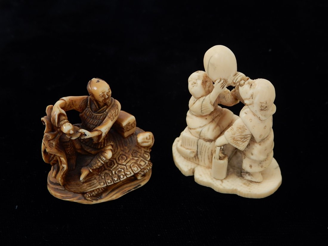 Two Japanese Carvings: Comprises: Netsuke of a man on tortoise and an Olomono; child with balloon man. Good condition.
