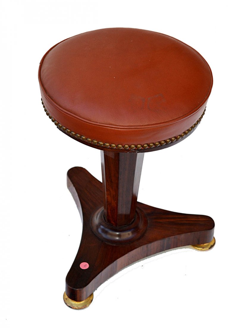 Empire Rosewood Piano Stool: Features an articulated pedestal support tapering toward bottom and tripod base. [13 1/4" Dia x 19 1/2" H]. Some chips and losses to trim.