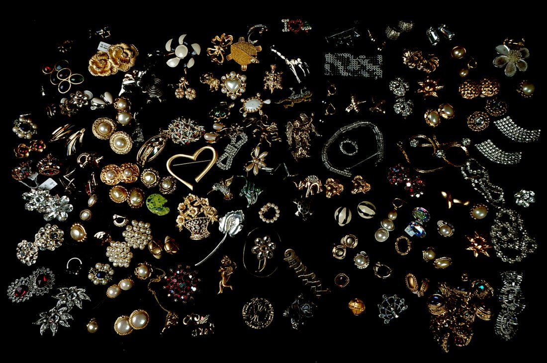 Costume Jewelry, Earrings, Brooches, etc: Assorted costume jewelry including the Metropolitan Museum of Art, rhinestones, colored cabochons, pearls, gold-tone and silver-tone, sterling marcasite elephant and turquoise inlay turtle, and others