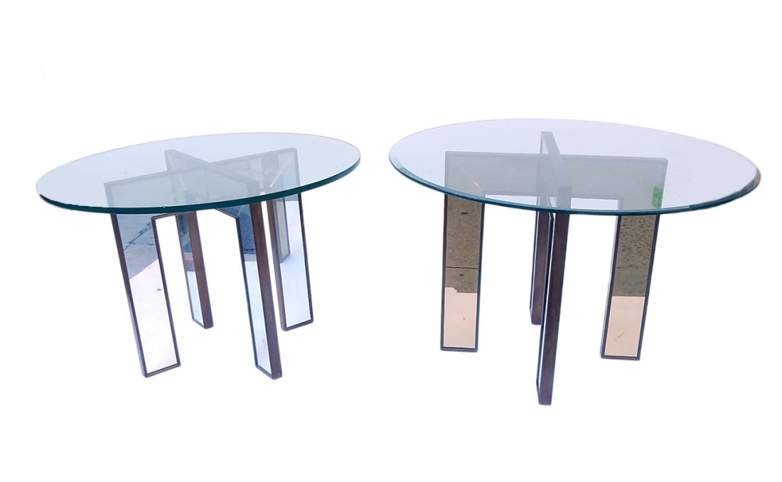 Pair of Mirrored X-Form Tables: Two mirrored panel tables with mismatched glass tops. [26" W x 26" D x 29" H]. One panel has a crack.