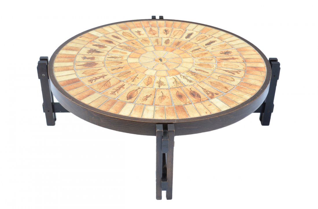 Faux Stone Top Coffee Table: Ceramic stone top coffee table with inlaid tiles, one raw in fossil motif. Overall good condition.