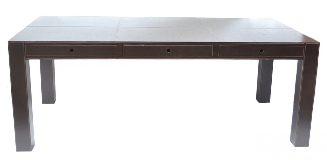 Leather Desk: Modern brown leather desk. Entire desk in leather, stitching visible. [80" W x 40" D x 30" H]. Overall good condition.